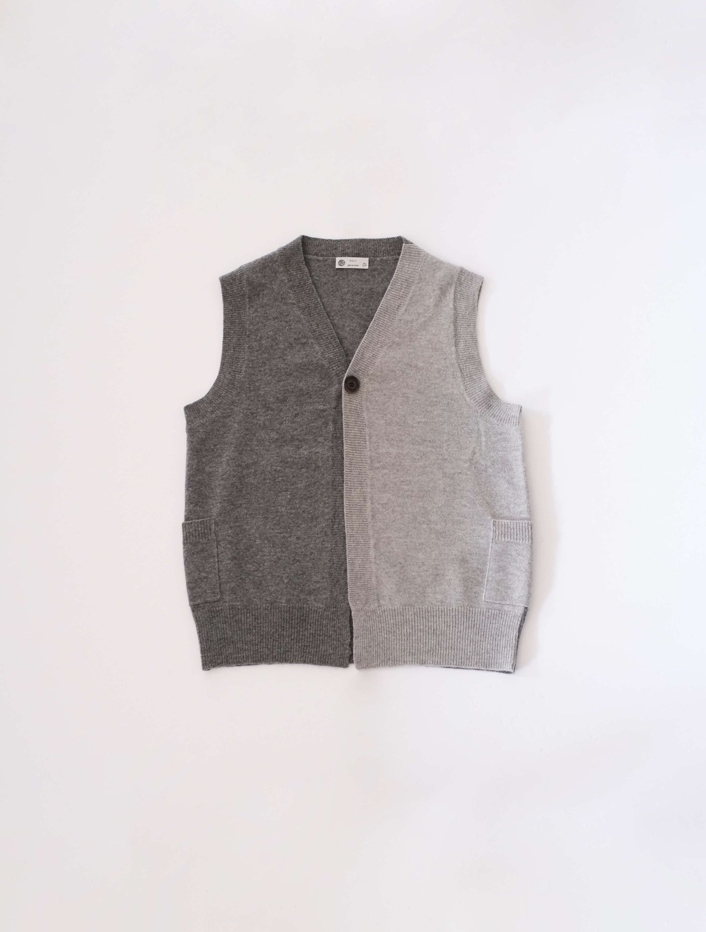2col vest 1BTN(Lim home)